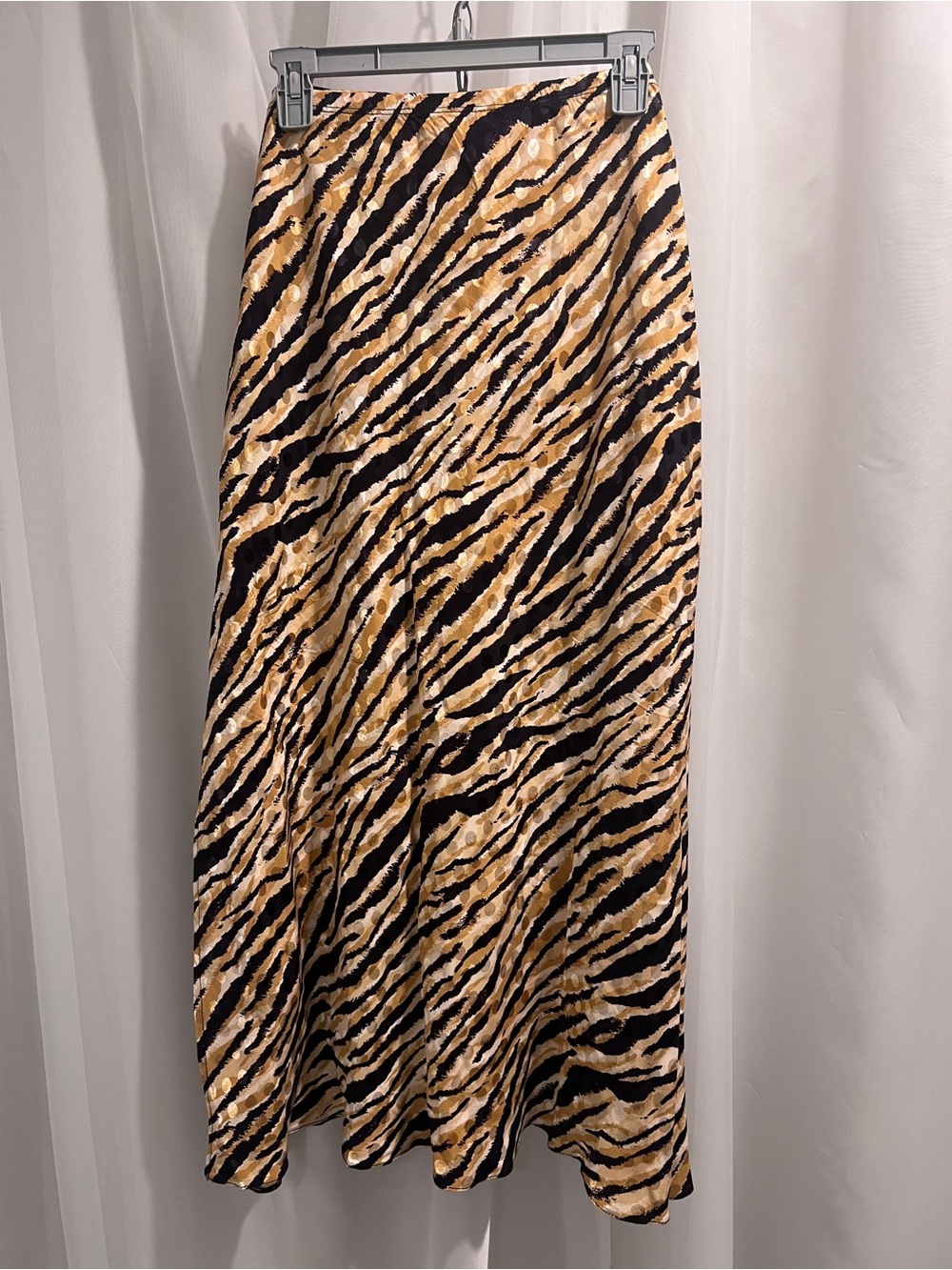 Woman’s Plus-size Animal Print Midi Skirt in Tan and Black